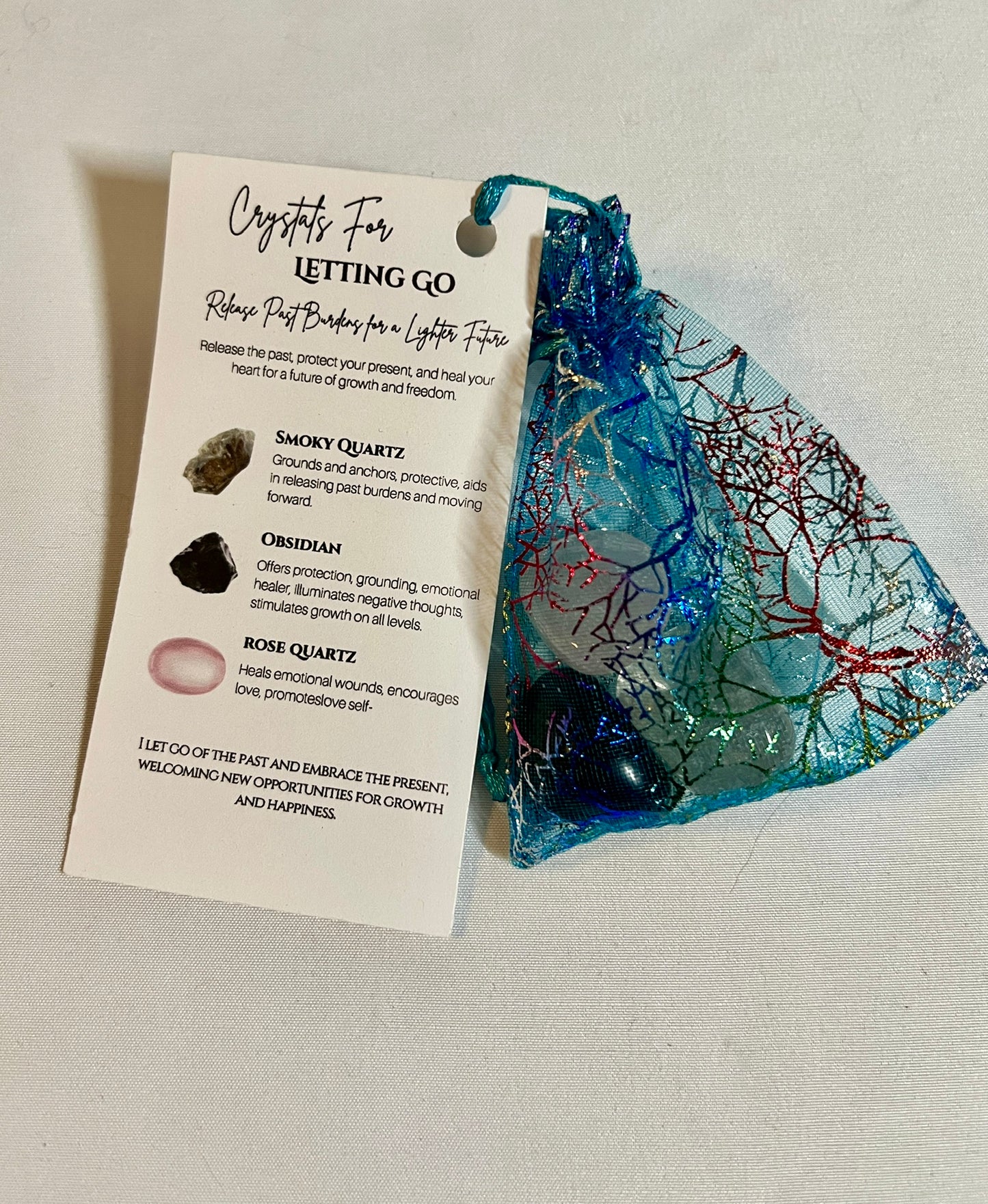 Crystal pouch for letting go