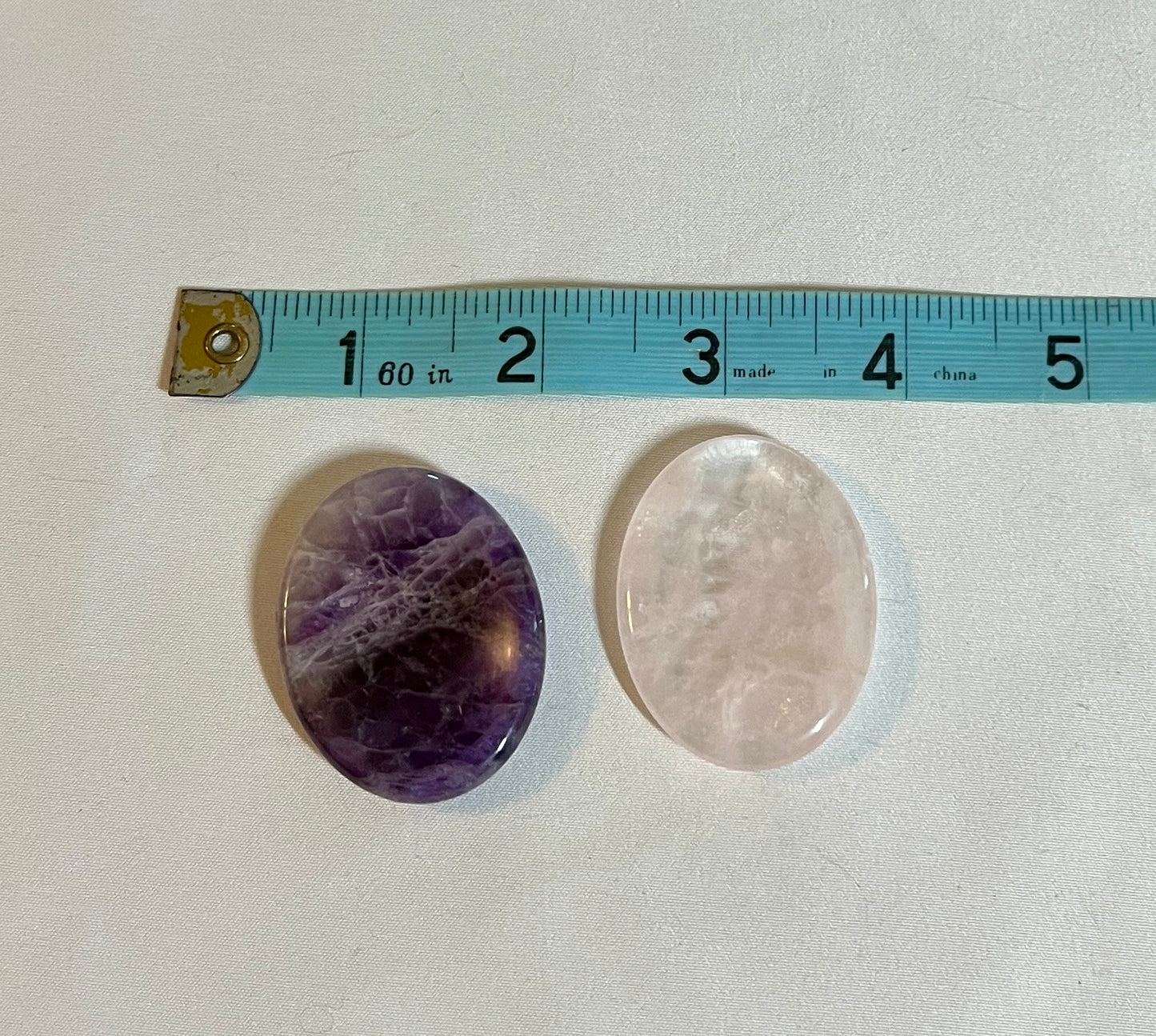 Rose quartz and amethyst worry stones